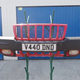 JEEP GRAND CHEROKEE ZDERZAK PRZEDNI HALOGENY 99-04