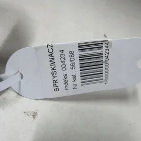 MAZDA CX-7 SPRYSKIWACZ REFLEKTORA LEWY 06-12 88