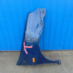 NISSAN ALMERA TINO BŁOTNIK PRZEDNI PRAWY