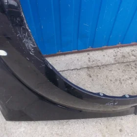 NISSAN NAVARA D40 PATHFINDER BŁOTNIK PRZEDNI PRAWY